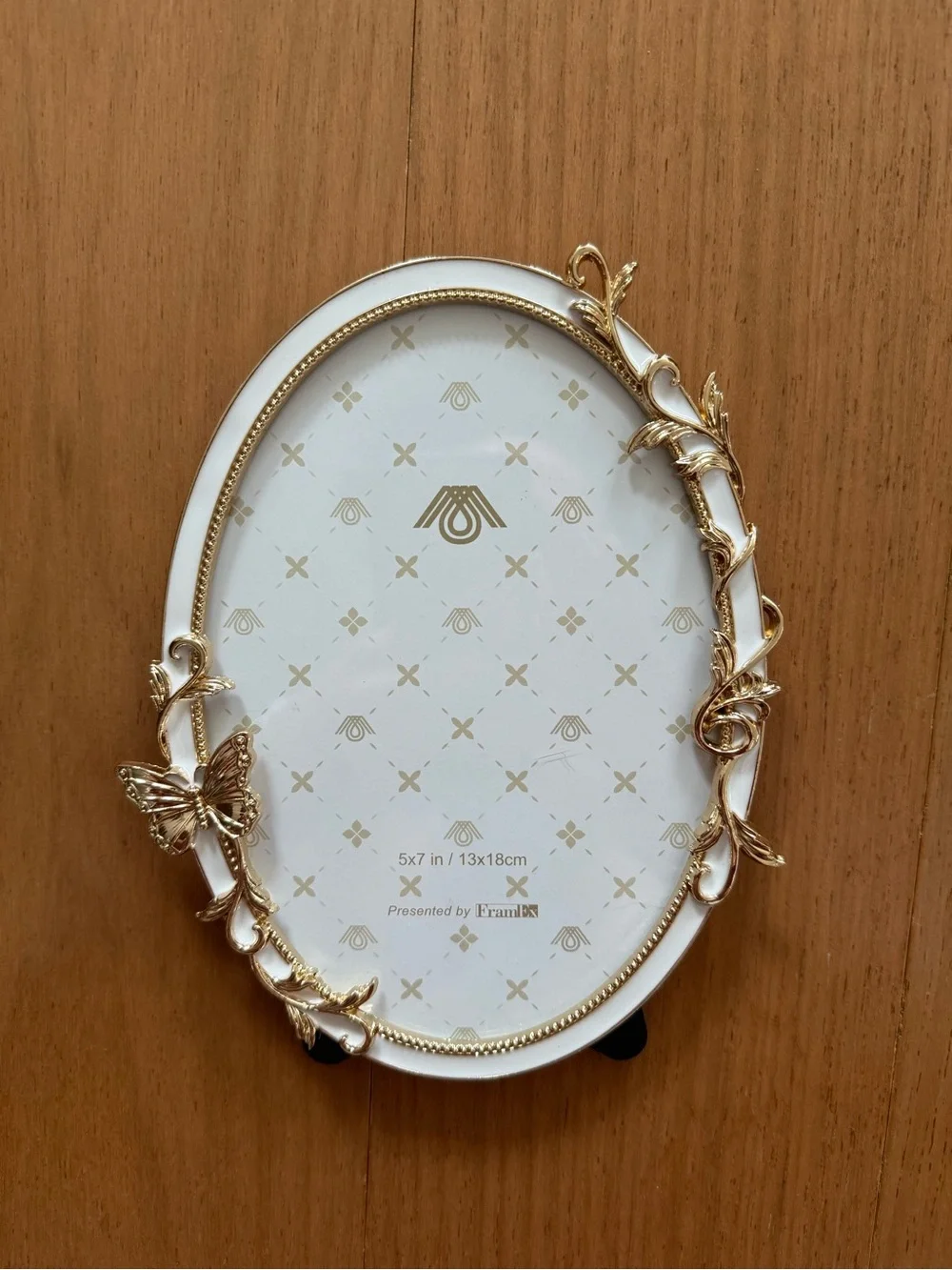 New 5 x 7 white oval picture frame with gold butterfly and leaf accents